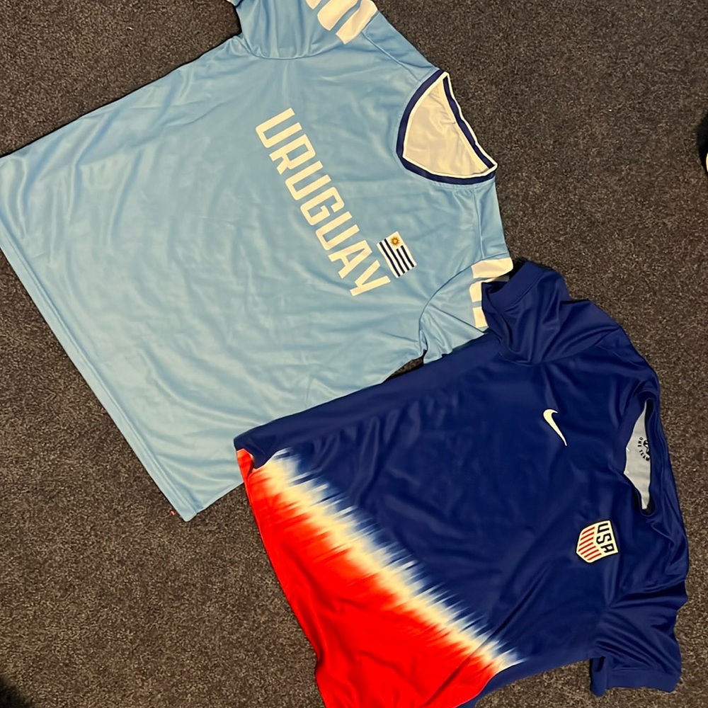 Two extra large soccer jerseys